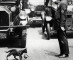New_York_City_Policeman_1925_httpsiconicphotos.org20090601mother-cat-stops-traffic_.jpg